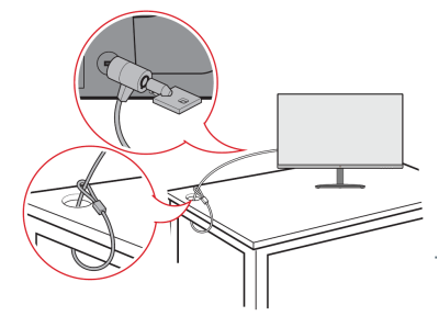 Securing the monitor to a desk using a security cable.